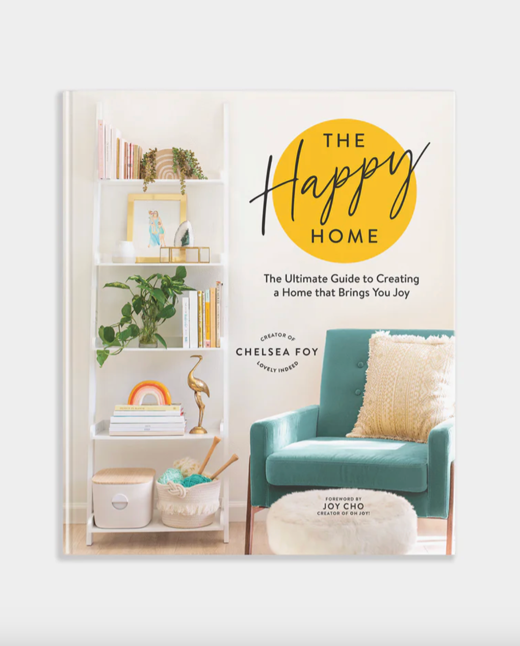 Book cover of 'The Happy Home' by Chelsea Foy with a home interior design theme.