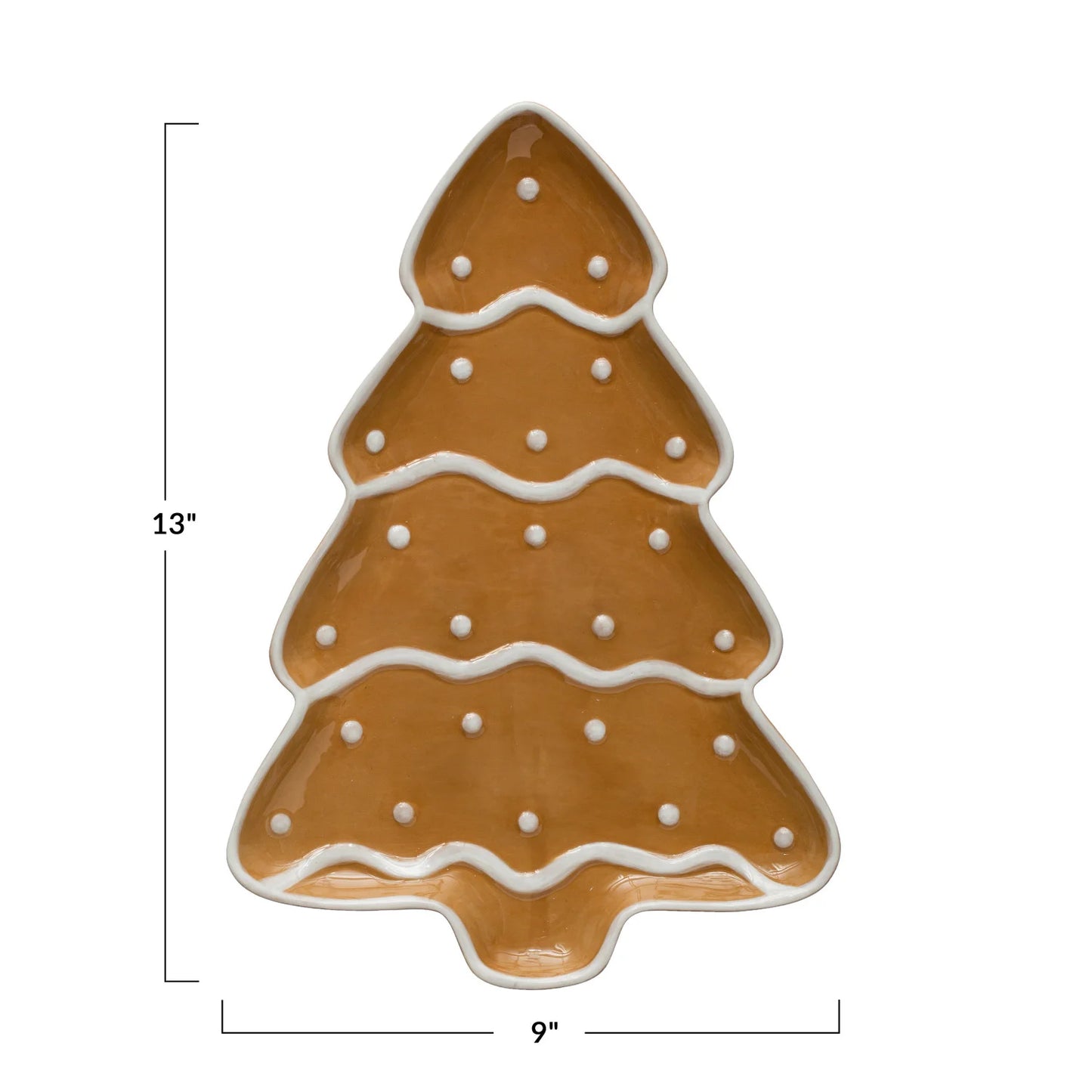 A ceramic gingerbread tree-shaped platter with a brown base and white decorative elements on a white background.