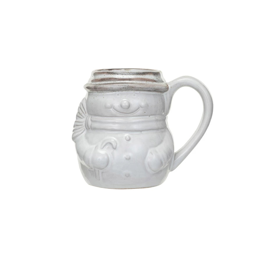 A stoneware mug with a snowman-shaped design and an antique white reactive glaze finish.