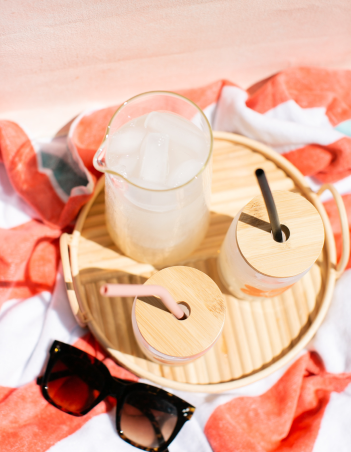 Photo of can glasses with bamboo lids on top