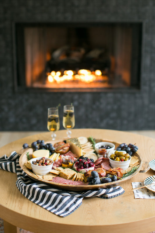 New Year's Eve Charcuterie Board with Bacon Wrapped Pears and Blackberry Champagne Cocktail