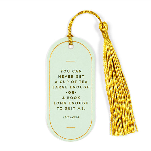 Light green bookmark with gold tassel and quote by C.S. Lewis on a white background