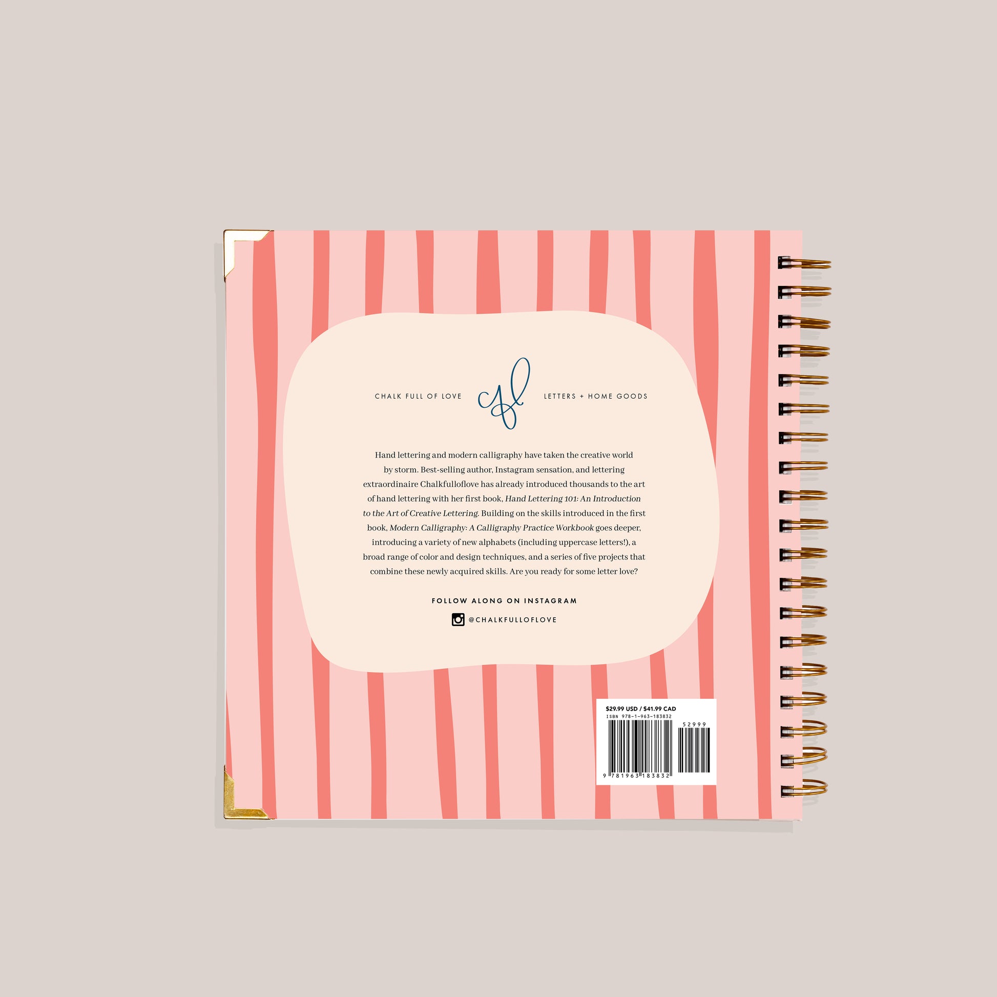 Back cover of a spiral-bound notebook with pink and white striped design and text.