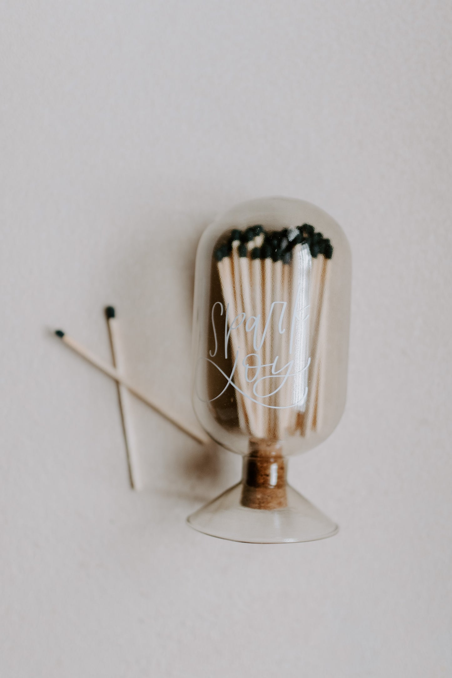 Decorative glass match holder with matches 