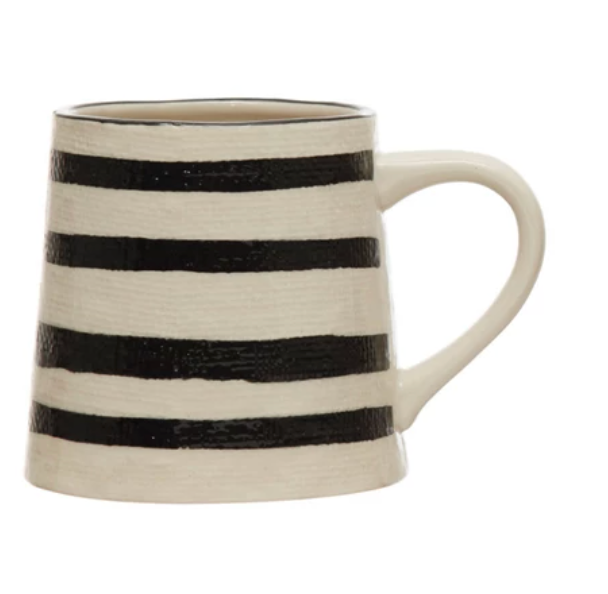 Ceramic mug with black and white stripes on a white background